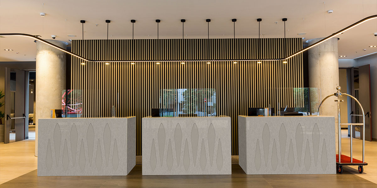 Kreativt design som beriker innendørsarealer med estetisk og funksjonelt design i fibersement.